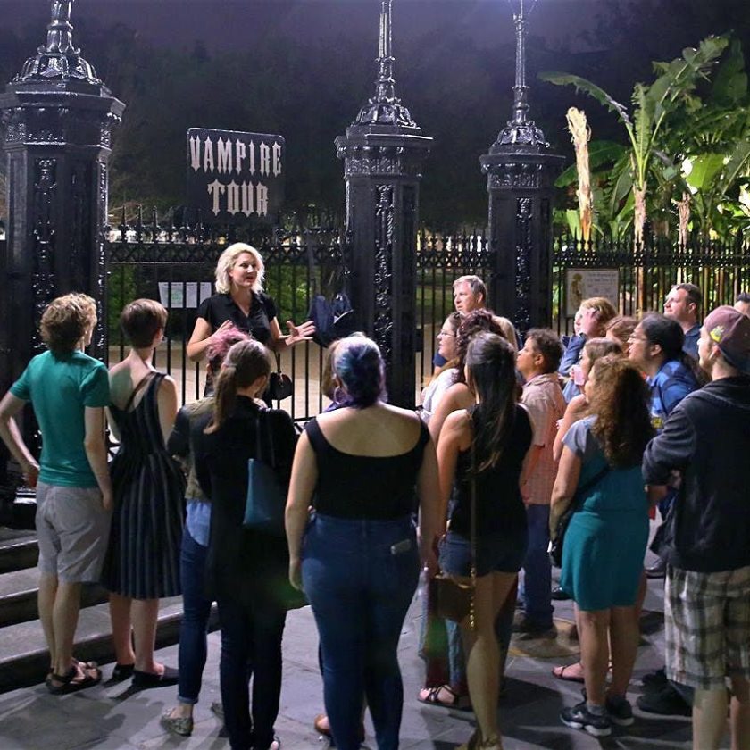 people crowded around vampire tour guide in New Orleans