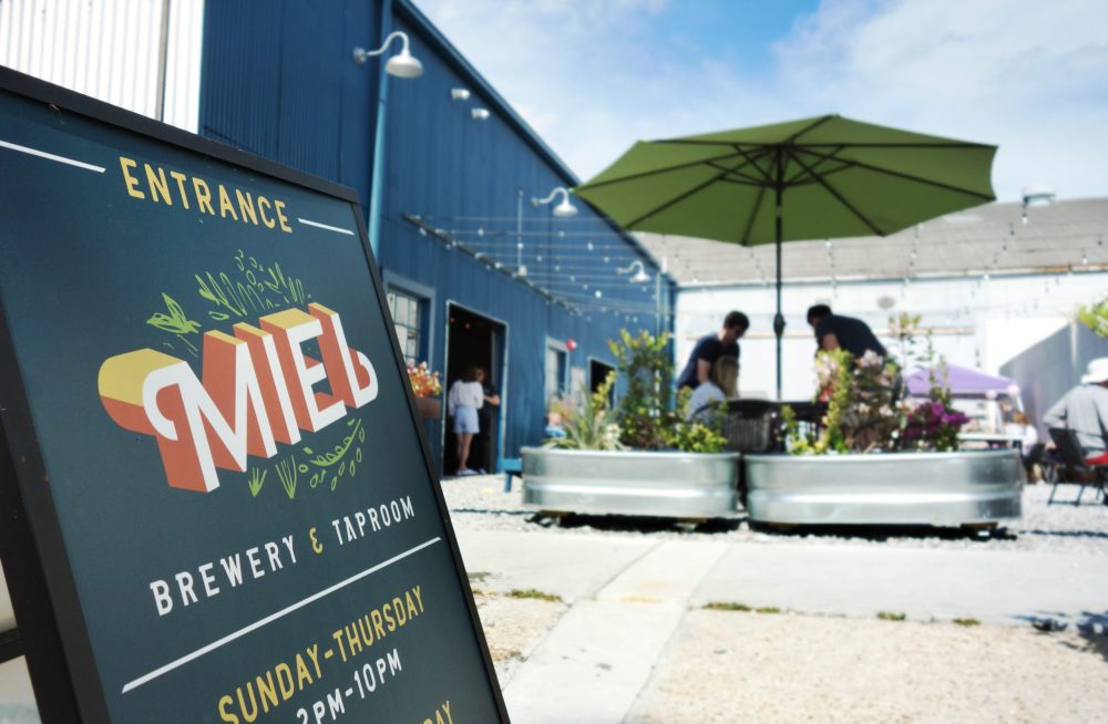 NEW ORLEANS,LA/USA -03-23-2019: The courtyard of Miel Brewery and Taproom in New Orleans, a craft brewery and tasting room