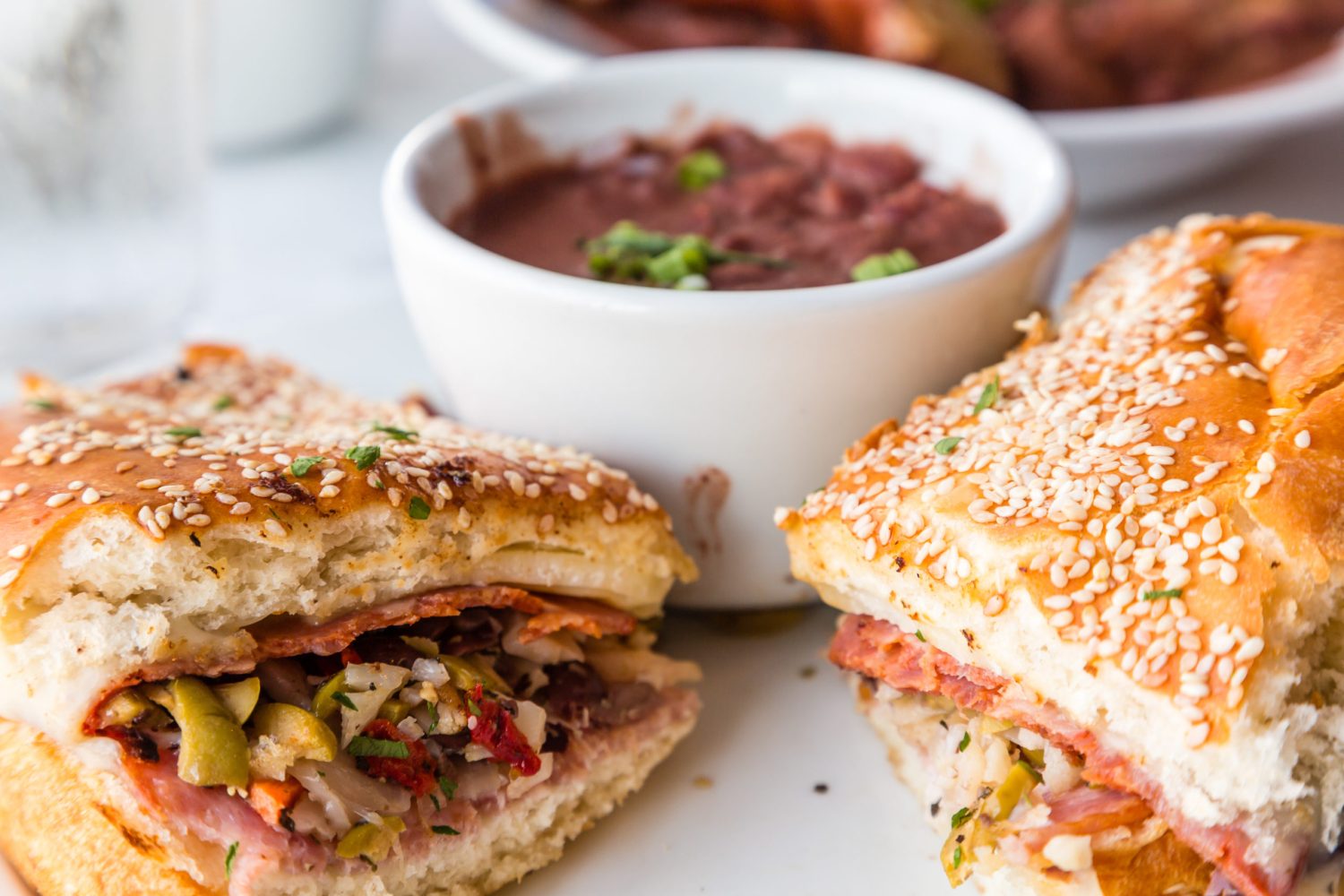 Muffalatta Sandwich with Cup of Red Beans in New Orleans Restaurant